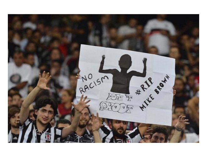 Photo tweeted from Turkish soccer fans to protest murder of Michael Brown.