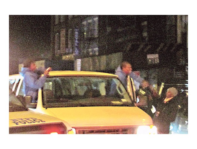 Cab drivers greet and embrace protesters. 
