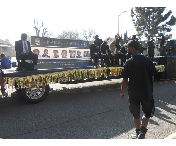 Los Angeles,  Martin Luther King Day 2015 - Alpha Phi Alpha Fraternity float '7 Jewels of Injustice.'  Photo: Special to revcom.us