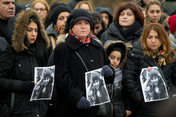 Demonstrators in Berlin hold photos of Tugce Albayrak, November 30, 2014