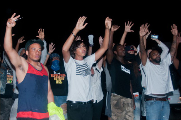 Ferguson, August 16, Saturday night, protesting curfew