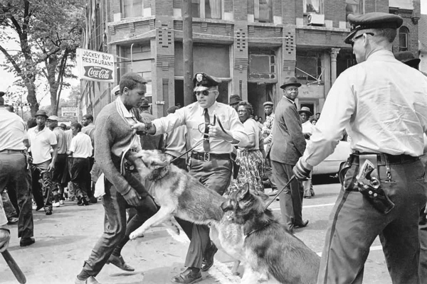 1965: Police use dogs to attack civil rights marchers in Birmingham, Alabama.