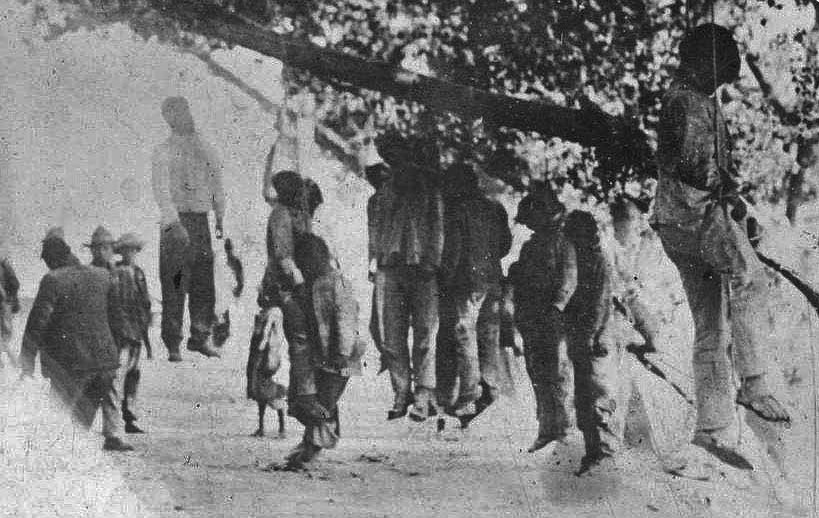 Seven Mexican shepherds were hanged by white vigilantes near Corpus Christi, Texas to drive Mexican landowners from the land, November 1873.
