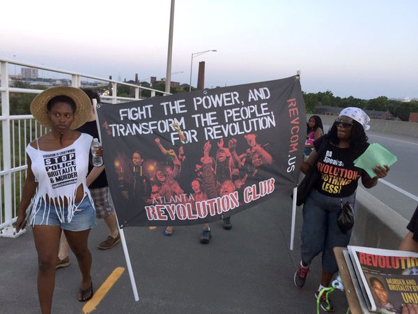 Revolution Club at the Unity Chain, where thousands formed a human chain across the Arthur Ravenel Bridge, Charleston.
