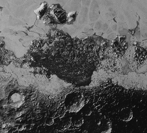 Dark features of Pluto