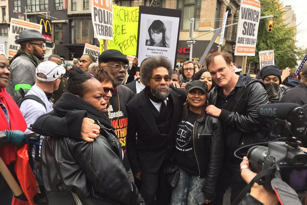 Eve Ensler, Carl Dix, Cornel West, Quentin Tarantino, on march with family members
