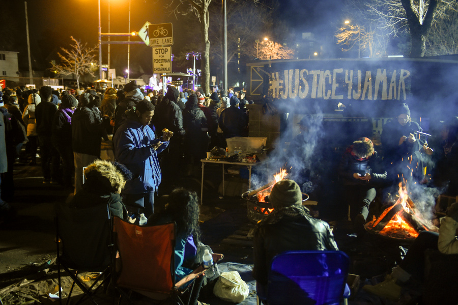 Demonstrators camp outside Minneapolis Police Department's 4th Precinct during a protest of the police murder of Jamar Clark, November 24. AP photo