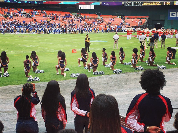 Cheerleaders at Howard University kneel for the anthem
