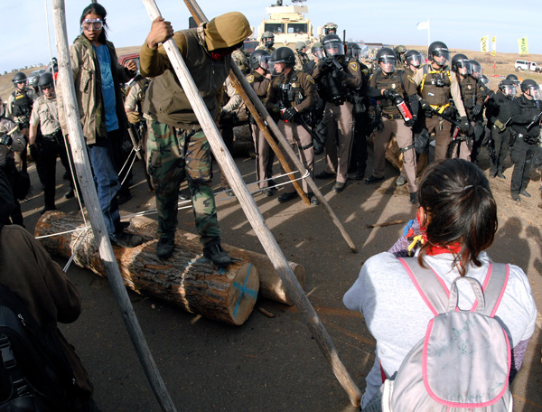 People at Standing Rock resisting police violence