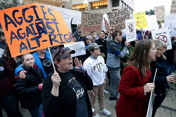 Hundreds of A&M students with homemade placards and banners joined thousands of people to protest neo-Nazi (aka 