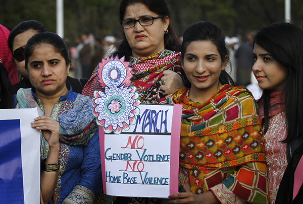 In Islamabad, Pakistan, women and men protested with signs calling for an end to attacks on women.