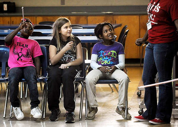 Trump's budget plan will cut $1.2 billion from funding after-school programs that involve more than 2 million kids.  Here kids in a Kentucky after-school program, 2012.