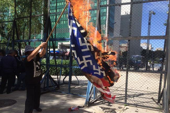 Burning the American flag at the U.S. Embassy, Mexico City, January 20, Trump's inauguration day.