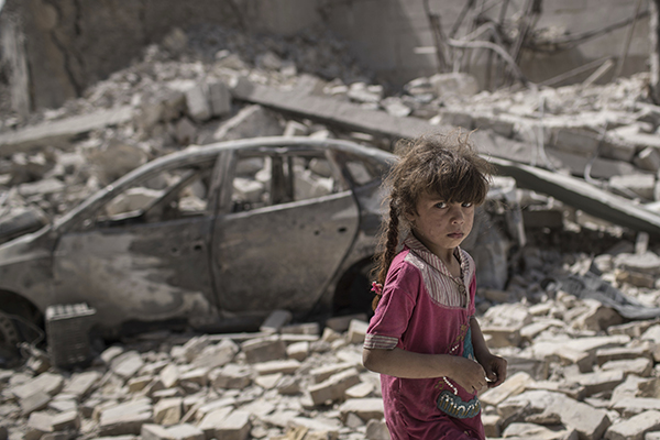 A young girl amid rubble in Mosul on July 2.