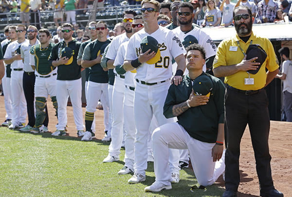 Bruce Maxwell of the Oakland A’s is the first Major League Baseball player to take a knee.