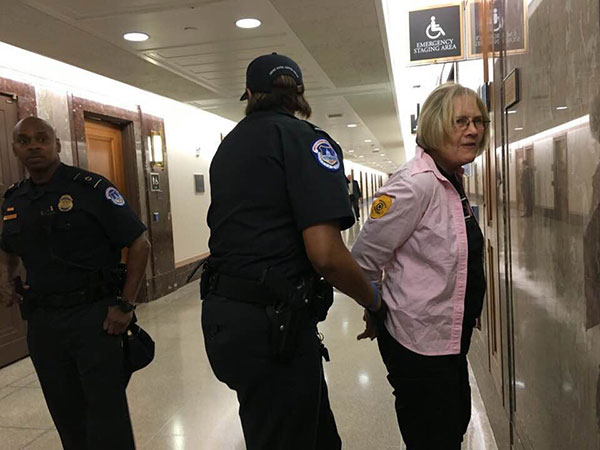 Ann Wright arrested at Pompeo hearing