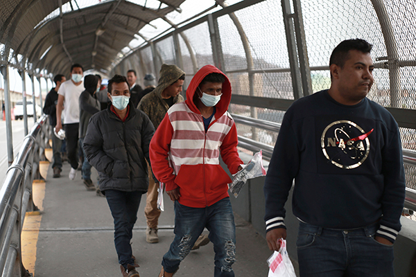 Immigrants from Mexico seeking asylum are turned back at the U.S.-Mexico border.