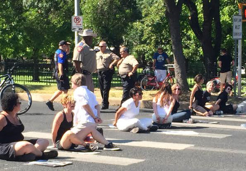 Abortion Rights Freedom Riders get arrested outside Gov. Rick Perry's mansion. August 13, 2014