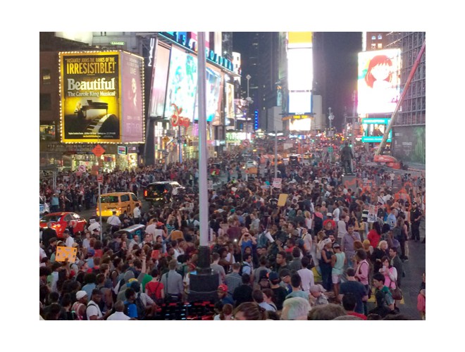 New York, Times Square, April 14.  Thousands marched and hundreds sat down.  Photo: AP